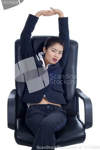 Image of exhausted attractive businesswoman