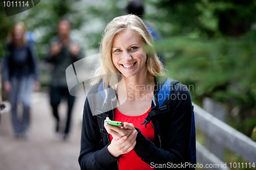 Image of Happy Woman with Cell Phone