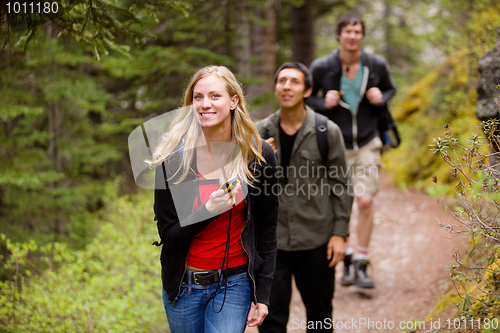 Image of Woman with GPS in Forest