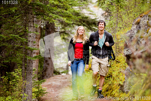 Image of Camping  Hiking Man and Woman