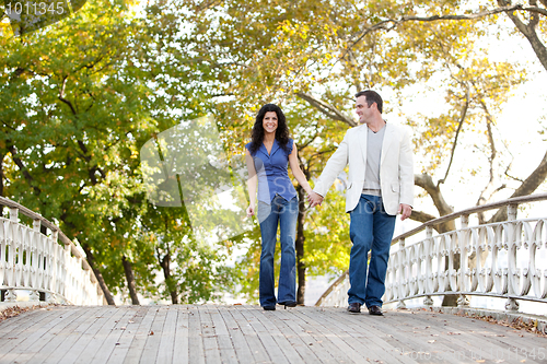 Image of Couple Walk Bridge