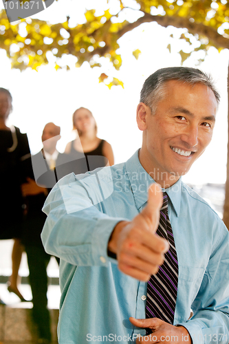 Image of Thumbs Up Business Man