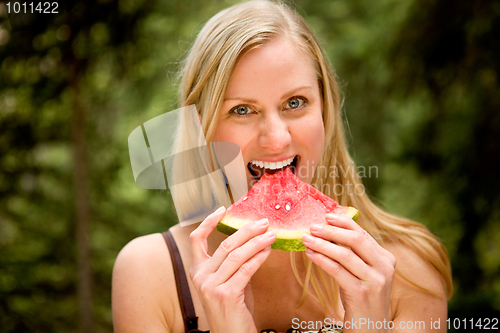 Image of Woman Eating Watermelon