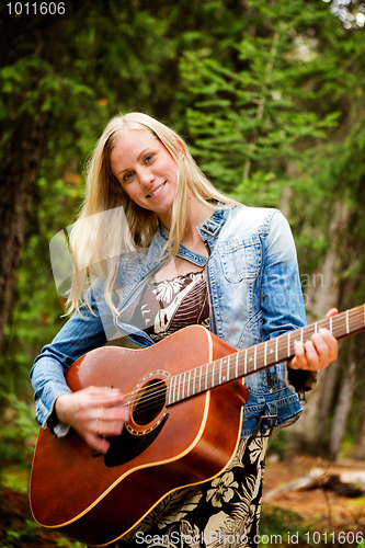 Image of Hippy Woman with Guitar