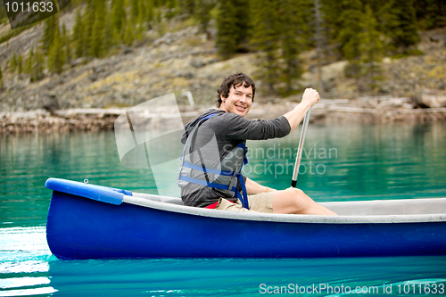 Image of Man Canoe Portrait