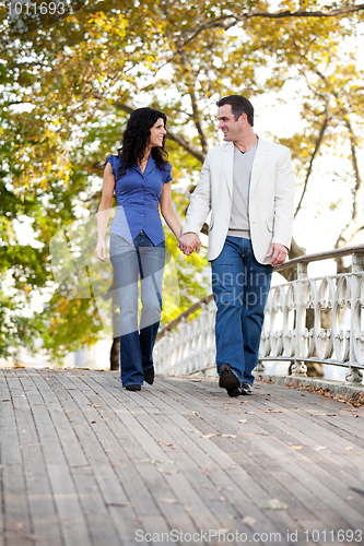 Image of Couple Walk Bridge