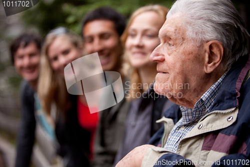 Image of Elderly Man Telling Stories