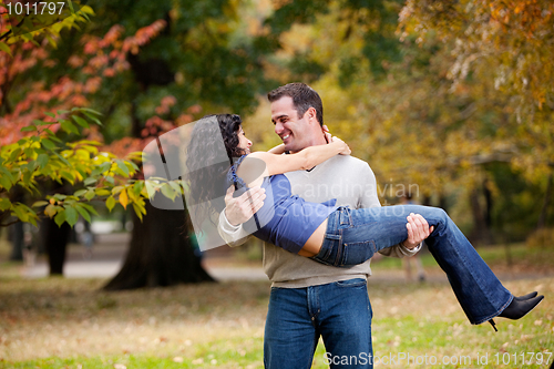 Image of Man Holding Woman