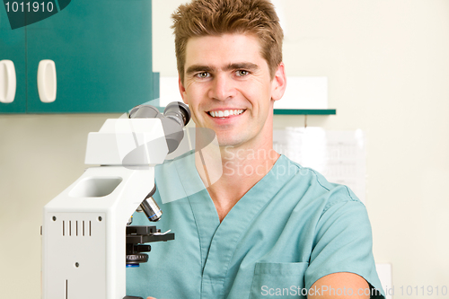 Image of Doctor with Microscope 