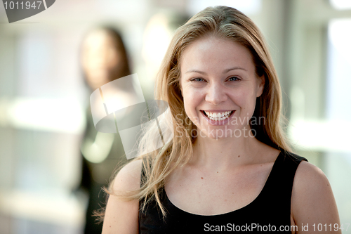 Image of Attractive Blonde Woman Smiling Broadly