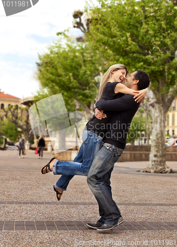 Image of Lift Hug - Happy European Couple