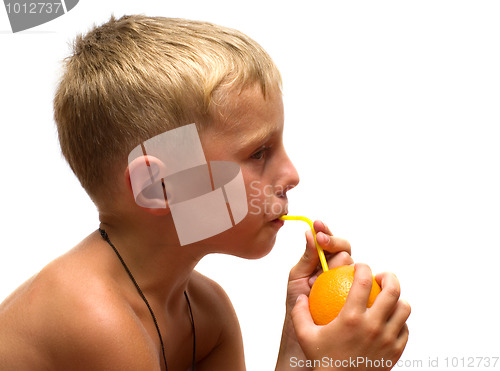 Image of Child with an orange.