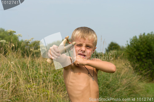 Image of Boy with a slingshot.