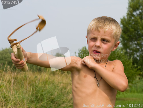 Image of Boy with a slingshot.