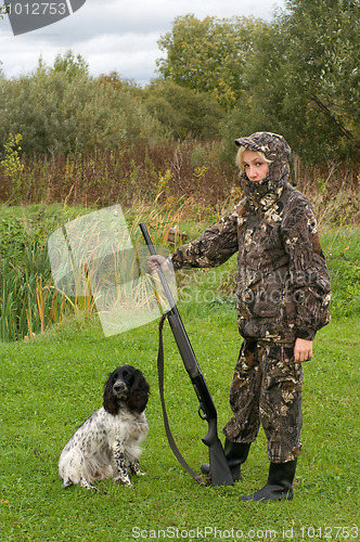 Image of Female with gun.