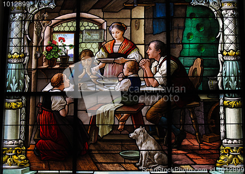 Image of Saying grace -family dinner