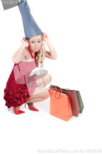 Image of Happy woman with Christmas presents