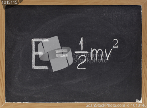 Image of kinetic energy equation on blackboard