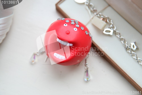 Image of red nose and wedding jewellery