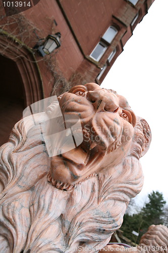 Image of lion statue at castle entrance