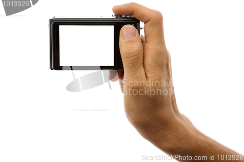 Image of Photo camera in hand isolated on white