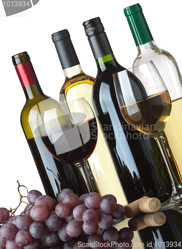 Image of Bottles, glasses and grapes