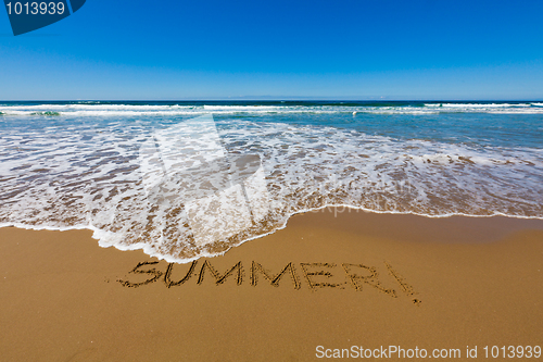 Image of Summer written in a sandy beach