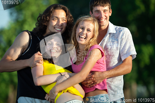 Image of A group of young people having fun in the park