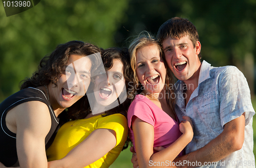 Image of A group of young people having fun in the park