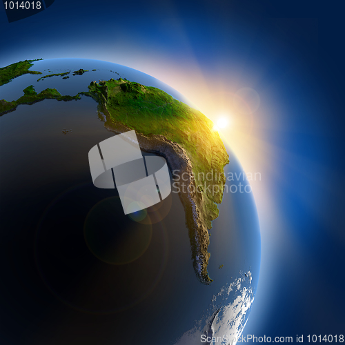 Image of Sunrise over the Earth in outer space