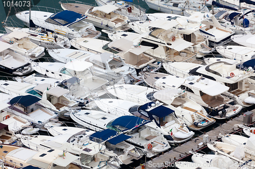 Image of Large parking boats at sea in a small seaside town