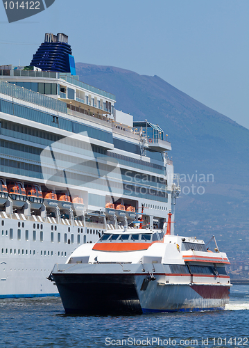 Image of Passenger catamaran and a large cruise ship