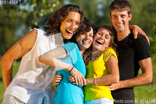 Image of A group of young people having fun in the park