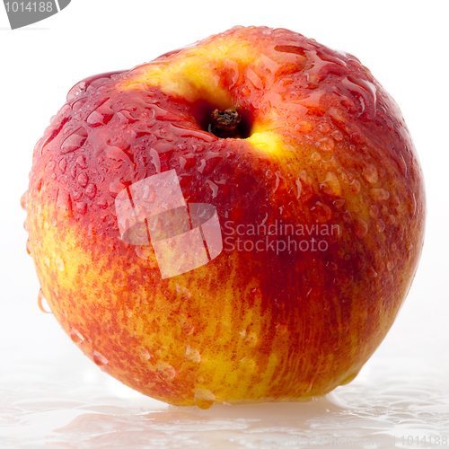 Image of Peach in droplets of water