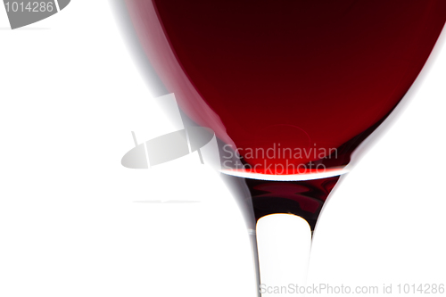 Image of A glass of red wine on white. Detail