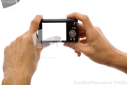 Image of Photo camera in hands isolated on white background