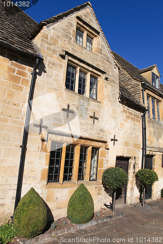 Image of Typical Cotswolds houses in Chipping Camden, Gloucestershire, made in the golden limestone for which the area in England is famous