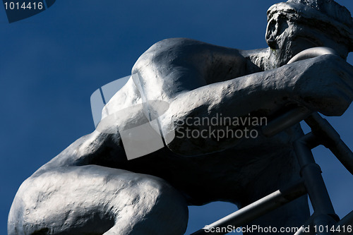 Image of Detail of a sculpture of a cyclist