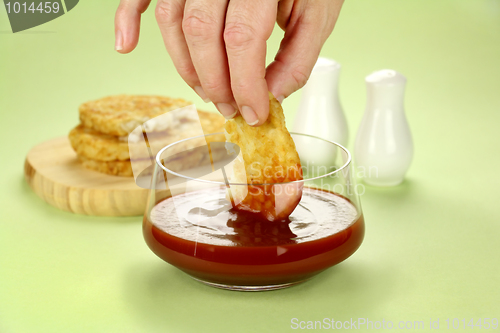 Image of Dipping Hash Browns