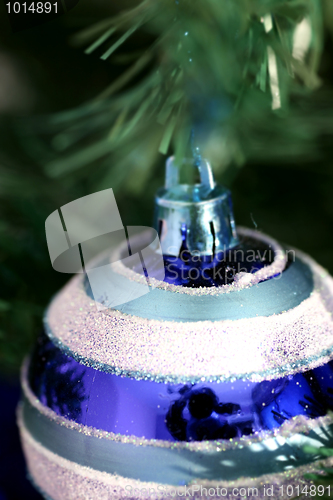 Image of Christmas ornaments on tree.