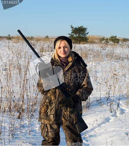 Image of Girl with a gun.