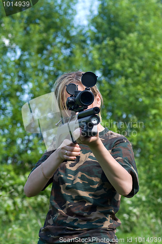 Image of The girl with an airgun.