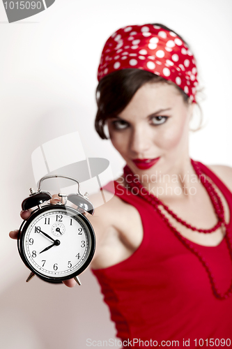Image of Girl holding a clock
