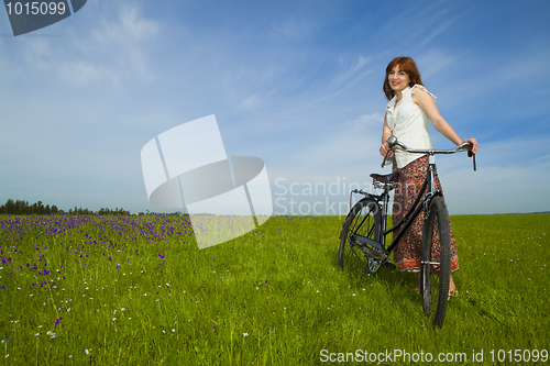 Image of Girl with a bicycle