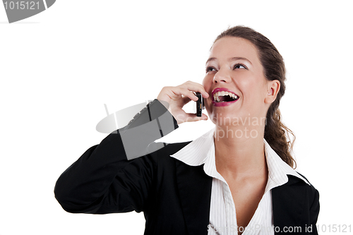 Image of Businesswoman talking on phone