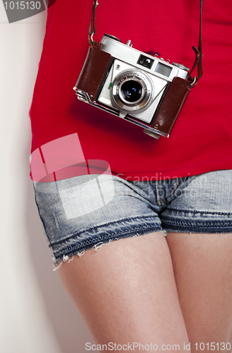 Image of Girl with a vintage camera