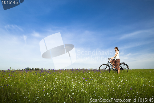 Image of Girl with a bicycle