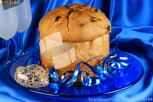 Image of Italian Christmas composition with panettone and spumante