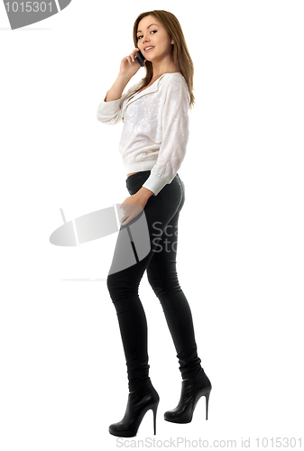 Image of Smiling young woman talking on the phone