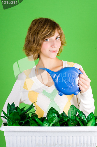 Image of girl watering flowers